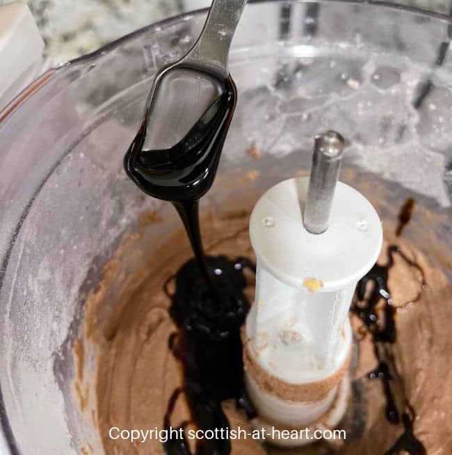 Adding treacle to Scottish Coburg Cake mixture Adding treacle to Scottish Coburg Cake mixture