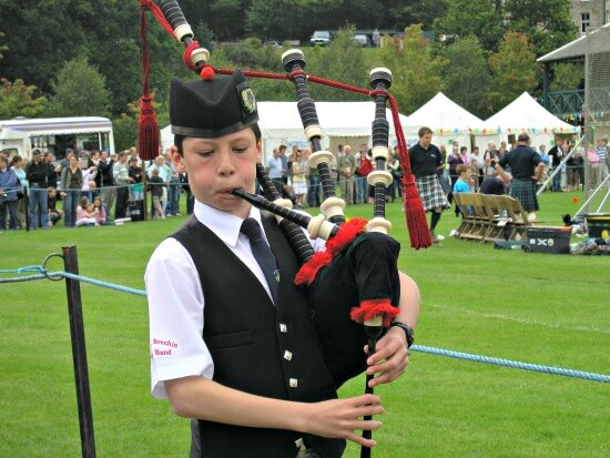 Piper in traditional Scottish Highland Games