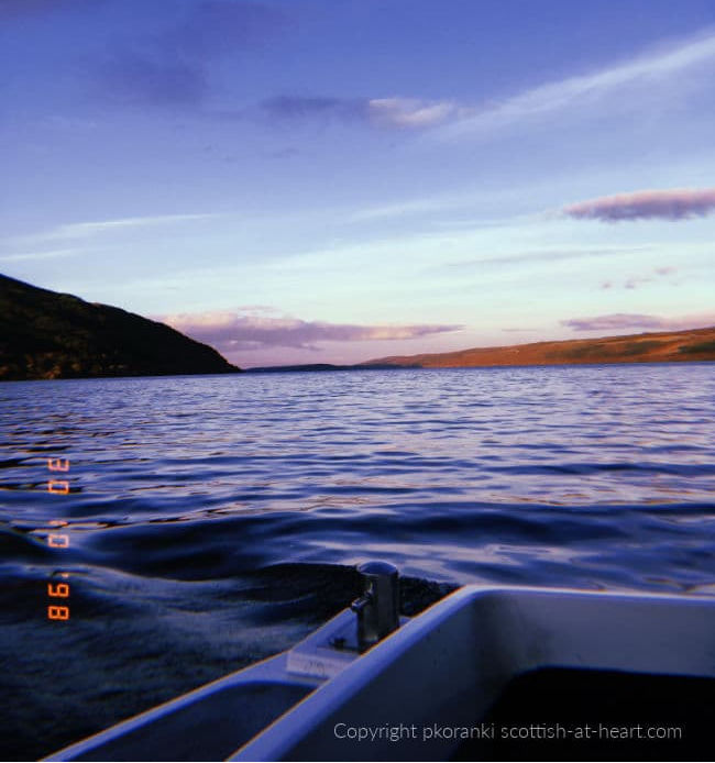 Loch Ness at sunset taken on the water. Home of Nessie, the loch monster