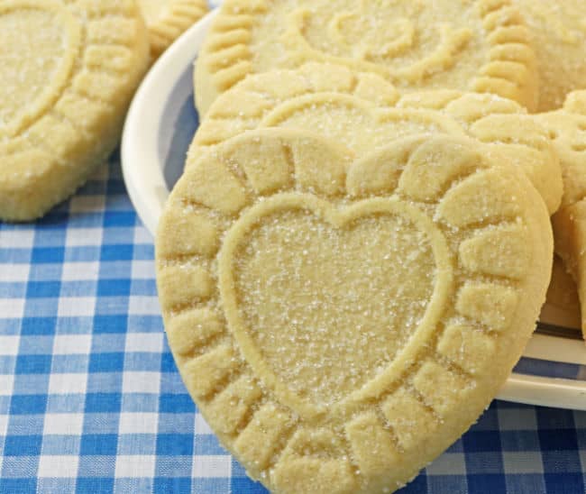 Shortbread hearts on blue checkered cloth Shortbread hearts on blue checkered cloth