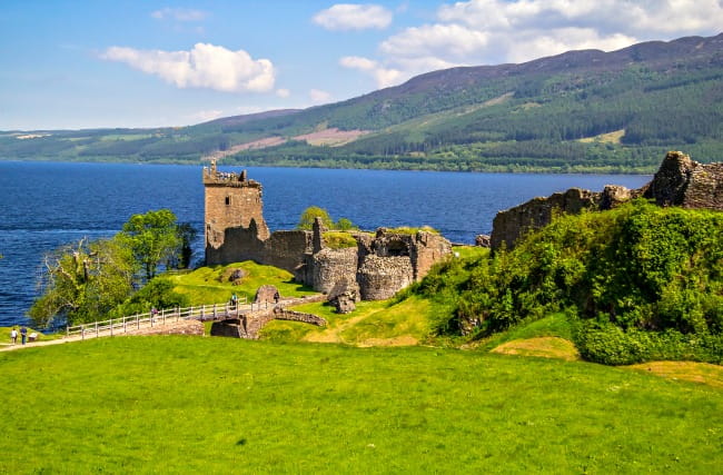 Urqhart Castle, Scotland, with Loch Ness in the background Urqhart Castle, Scotland, with Loch Ness in the background
